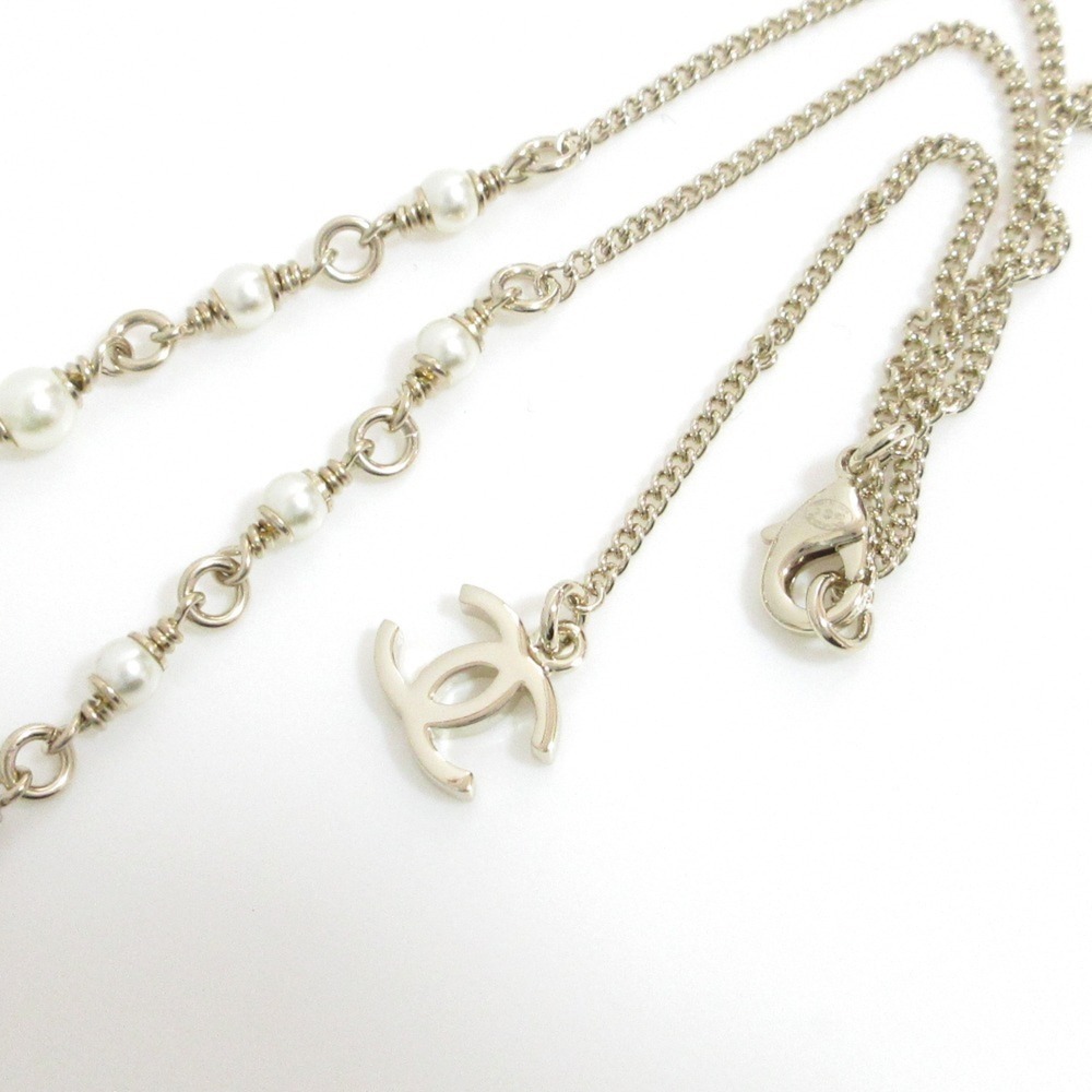CHANEL Gold Pearl Logo Necklace - Picture 7 of 11